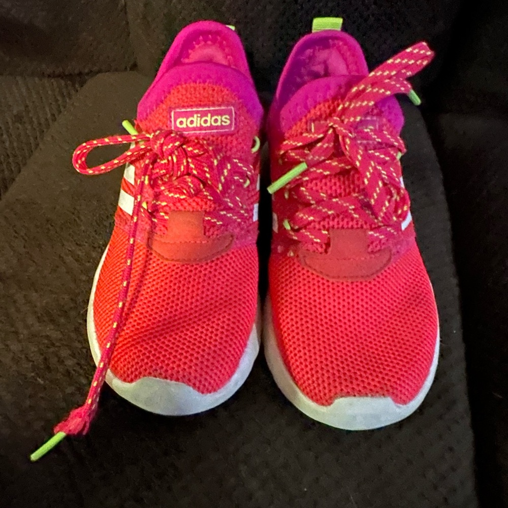 Pink and white adidas shoes